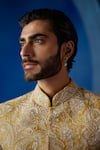 Mrunalini Rao_Yellow Sherwani Raw Silk Embroidered Resham And Pearl Work Nevan Set _Online_at_Aza_Fashions