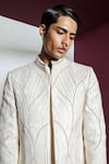 Buy_Contrast By Parth_Cream Jacquard Embroidered Thread Khwaab Abstract Sherwani Set 