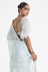 Shop_Nitika Gujral_Blue Net, Georgette Sequins, Pre-draped Floral Embellished Saree With Blouse _at_Aza_Fashions
