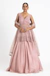 Buy_Nitika Gujral_Pink Net, Organza Sequins, Beads, Embroidery V-neck Peplum Jacket Lehenga Set _at_Aza_Fashions