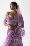 Buy_Nitika Gujral_Purple Net Embellished Sequin V Neck Bead Embroidered Fish-cut Lehenga Set _Online_at_Aza_Fashions