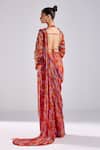 Shop_DiyaRajvvir_Orange Georgette Printed Wave Pre Draped Pant Saree With Blouse _at_Aza_Fashions