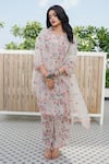 Buy Gulabo Jaipur Peach Muslin Sequins Split V-neck Muskan Floral Print Straight Kurta Pant Set at Aza Fashions Buy_Gulabo Jaipur_Peach Muslin Sequins Split V-neck Muskan Floral Print Straight Kurta Pant Set_at_Aza_Fashions