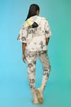 Shop_SO US by Sougatpaul_Off White Cotton Printed Garden V Neck Morden Mood Top And Pant Set _at_Aza_Fashions