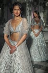 Buy_Seema Gujral_White Net Embroidery Crystal V Neck Chandelier Bridal Lehenga Set _Online_at_Aza_Fashions