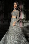 Shop_Seema Gujral_Silver Net Embroidered Sequins Plunging V Blouse Bridal Lehenga Set _Online_at_Aza_Fashions