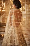 Shop_Seema Gujral_Gold Net Embroidered Sequins Leaf Neck And Crystals Bridal Lehenga Set _at_Aza_Fashions