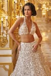 Seema Gujral_White Net Embroidered Sequins Halter Blouse Lehenga Set _Online_at_Aza_Fashions