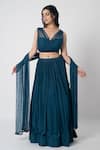 Buy_LABEL SHRISTI CHETANI_Blue Crepe Hand Embroidered Cutdana V Neck Ambar Blouse Lehenga Set _at_Aza_Fashions