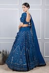 Shop_Kohsh_Blue Georgette Embroidered Resham V-neck Jaal Sequin Lehenga Set  _at_Aza_Fashions