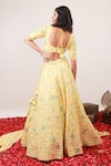 Shop_Kohsh_Yellow Georgette Embroidered Sequin V-neck Blossom Lehenga Set  _at_Aza_Fashions