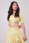 Kohsh_Yellow Georgette Embroidered Sequin V-neck Blossom Lehenga Set  _Online_at_Aza_Fashions