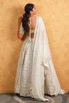 Shop_Kohsh_White Georgette Embroidered Sequin V-neck Blossom Lehenga Set  _at_Aza_Fashions