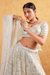 Buy_Kohsh_White Georgette Embroidered Sequin V-neck Blossom Lehenga Set  _Online_at_Aza_Fashions