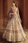 Buy_Annus Creation_Beige Silk Embroidered Cutdana Sweetheart Embellished Bridal Lehenga Set _at_Aza_Fashions