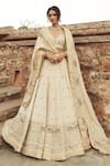 Buy_Annus Creation_Ivory Silk Embroidered Cutdana Floral Elephant Motif Bridal Lehenga Set _at_Aza_Fashions