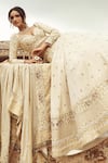 Buy_Annus Creation_Ivory Silk Embroidered Cutdana Floral Elephant Motif Bridal Lehenga Set _Online_at_Aza_Fashions