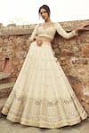 Shop_Annus Creation_Ivory Silk Embroidered Cutdana Floral Elephant Motif Bridal Lehenga Set _Online_at_Aza_Fashions