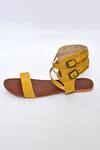 Naintara Bajaj_Yellow Plain Criss Cross Strap Effect Flats_Online_at_Aza_Fashions