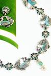 Shop_Mero Jewellery_Blue Crystals Tribal Peacock Carved Necklace Set_at_Aza_Fashions