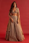 Buy_Reeti Arneja_Gold Organza, Net Cut Work, Smocking Zardozi Embroidered Bridal Lehenga Set _at_Aza_Fashions