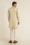 Shop_Dhruv Vaish_Beige Modal Satin Plain Solid Asymmetric Panelled Kurta Set  _at_Aza_Fashions