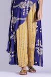Studio Surbhi_Yellow Georgette, Satin Piping Bandeau Printed Asymmetric Top And Pleated Pant Set _Online_at_Aza_Fashions