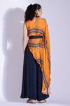 Shop_Studio Surbhi_Orange Georgette, Satin Bandeau Neck Abstract Print Asymmetric Top And Flared Pant _at_Aza_Fashions