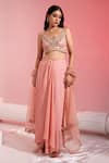 Buy_SWATI WADHWANI COUTURE_Peach Georgette Embroidered Thread Tasseled Blouse Draped Skirt Set _at_Aza_Fashions