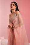 Buy_SWATI WADHWANI COUTURE_Peach Georgette Embroidered Thread Tasseled Blouse Draped Skirt Set _Online_at_Aza_Fashions