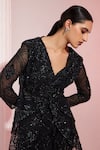 SWATI WADHWANI COUTURE_Black Net Embroidered Sequin V Neck Peplum Jacket Pant Set  _at_Aza_Fashions