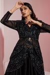 SWATI WADHWANI COUTURE_Black Net Embroidered Sequin V Neck Peplum Jacket Skirt Set _at_Aza_Fashions