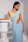 Buy_SWATI WADHWANI COUTURE_Blue Georgette Embroidered Sequin V Pre-draped Saree With Blouse _Online_at_Aza_Fashions