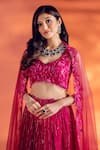 Shop_Kiyohra_Magenta Net Embroidered Glass Beads Leaf Krissa Floral Bridal Lehenga Set _at_Aza_Fashions