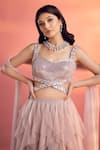 Shop_Kiyohra_Grey Net Embellished Sequin Sweetheart Ries Ruffle Lehenga Blouse Set _at_Aza_Fashions