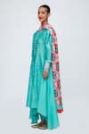 Lila_Blue Cotton-silk Blend Solid Floral Round Zahira Asymmetric Kurta Pant Set _Online_at_Aza_Fashions