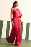 Buy_Reeti Arneja_Pink Pleated Satin Plain Asymmetric Neck Evara Jumpsuit _Online_at_Aza_Fashions