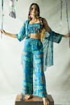 Shop_DOH TAK KEH_Blue Georgette Embroidered Tassels Square Bindoo Pleated Hand Blouse _Online_at_Aza_Fashions