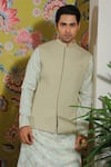 Shop_YAJY by Aditya Jain_Green Banarasi Silk Woven Floral Quilted Bundi And Kurta Set _at_Aza_Fashions