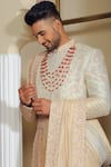 Buy_YAJY by Aditya Jain_Pink Silk Embroidery Thread Paisley Sherwani Set _Online_at_Aza_Fashions