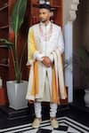 Buy_YAJY by Aditya Jain_Ivory Silk Embroidery Thread Bloom Sherwani Set _at_Aza_Fashions