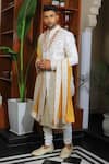 Shop_YAJY by Aditya Jain_Ivory Silk Embroidery Thread Bloom Sherwani Set _Online_at_Aza_Fashions