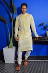 Buy_YAJY by Aditya Jain_Yellow Silk Embroidered Thread Tie-dye Kurta And Churidar Set _at_Aza_Fashions