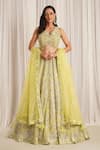 Buy_Chaashni by Maansi and Ketan_Green Organza Embroidered Sequin V-neck Lehenga Set _at_Aza_Fashions