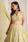 Chaashni by Maansi and Ketan_Green Organza Embroidered Sequin V-neck Lehenga Set _at_Aza_Fashions