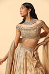 MeenaGurnam_Dola Silk Embroidery Dabka Off Plumeria Bloom Lehenga Blouse Set _at_Aza_Fashions