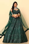 Buy_MeenaGurnam_Green Net Embroidery Sequin Sweetheart Lehenga Set _at_Aza_Fashions