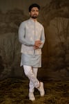 Shop_Darshika Menswear_Blue Suiting Fabric Embroidered Foliage Bundi Kurta Set _at_Aza_Fashions