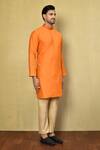 Arihant Rai Sinha_Orange Cotton Plain Embroidered Neck Kurta Set_at_Aza_Fashions