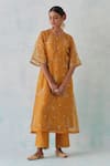 Buy_Ikshita Choudhary_Yellow Chanderi, Tissue Sequins, Beads, Paisley Pattern Kurta And Flared Pant Set _at_Aza_Fashions